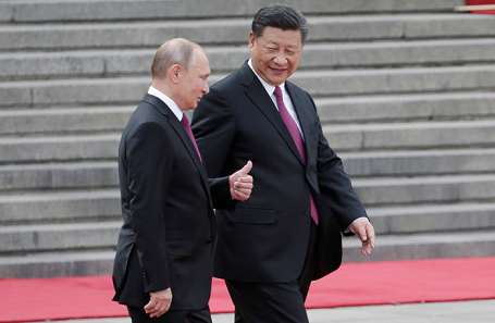 Президент Росії продемонстрував китайському колезі зображення лазні і шматок дерева, на що Сі пожартував, чи отримав він будова цілком   Володимир Путін і Сі Цзіньпін